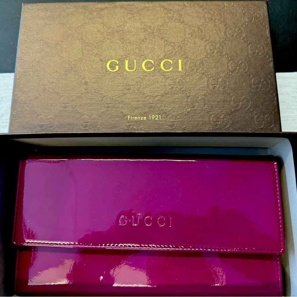 Gucci plum colored patent leather trifold wallet